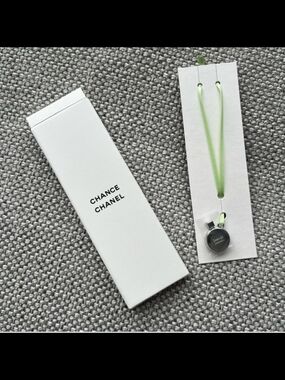 CHANEL Silver Round Pendant Necklace with Light Green Cord